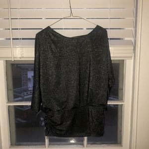 Great comfortable shirt , stretchy material . 3/4 sleeves. Great holiday shirt.